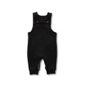 Black baby overalls or dungarees with dark wooden buttons and cuffed ankles