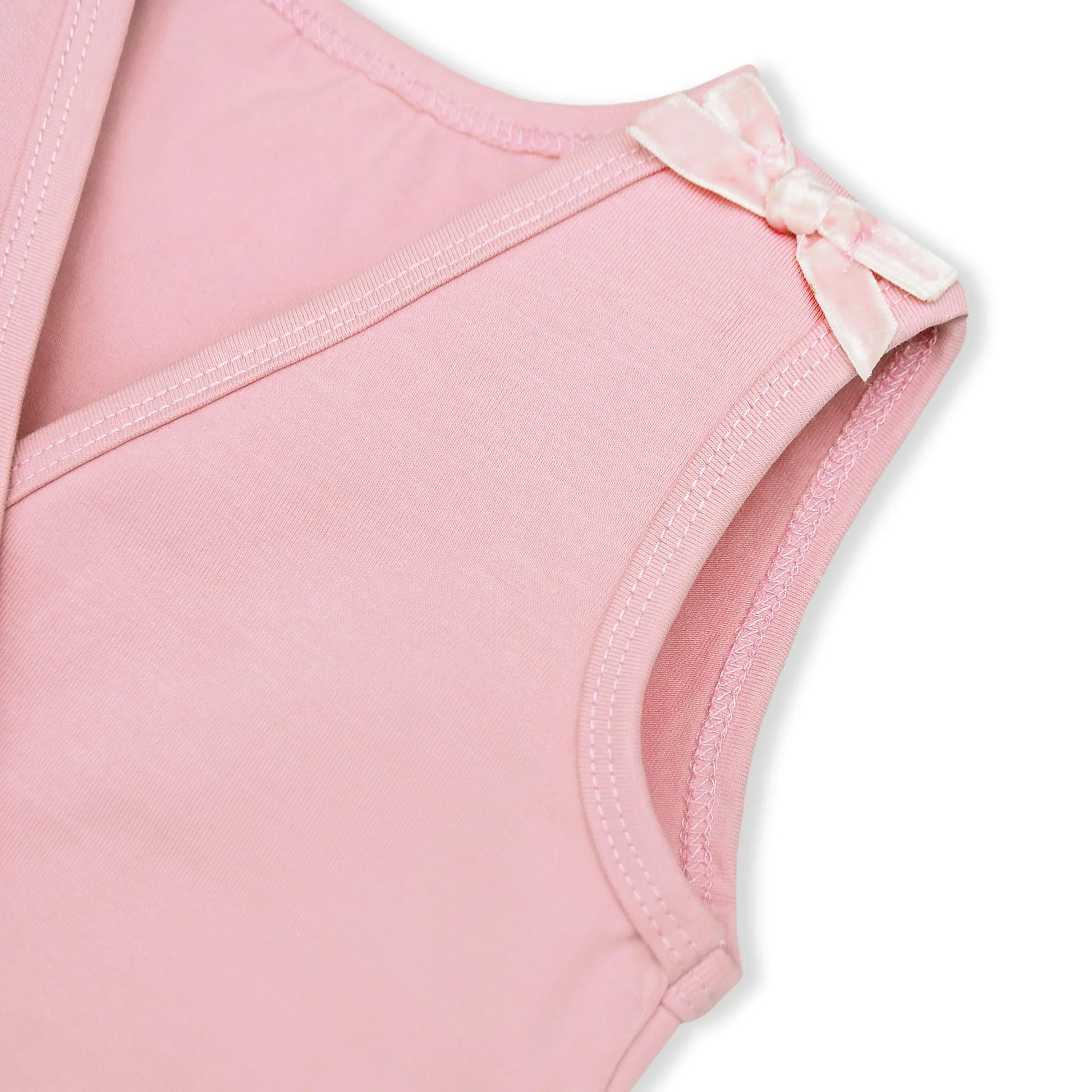 Soft pink sleeveless baby girl romper with shoulder bows, lightweight summer cotton outfit for newborns and infants. #BabyGirlRomper #PinkBabyOutfit #NewbornClothes #InfantRomper #SleevelessBabySuit #SummerBabyWear #CottonBabyClothes #BabyGirlStyle #BabyFashionPakistan #ComfortableBabyWear
