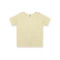 Newborn baby outfit featuring a soft pastel yellow T-shirt with snap buttons on the shoulders. The design highlights comfort and breathability, perfect for warm days. The background includes playful doodles,' and branding from Palm and Pale, emphasizing 'Sunny styles for little smiles.'