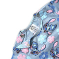 Baby romper with cartoon character pattern and brand label on a white background